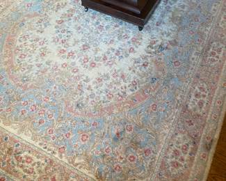 5’x8’ Karastan cream oriental rug in entry