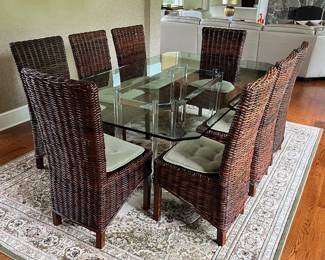 Glass Top Dining Table, Set of 8 Woven Chairs, Area Rug