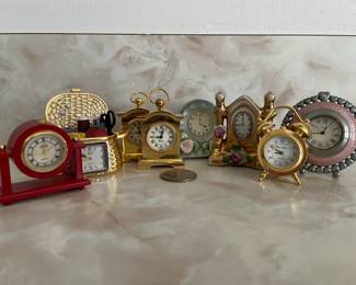 Some of Beautiful, Fun,  Mini-Clock Collection--Note: Penny at Center for size comparison