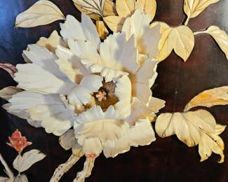 Amazing carved three-dimensional peony the size of a saucer