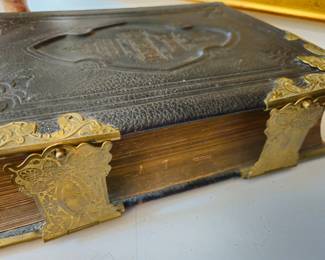 Bible with elaborate brass clasps in excellent condition.