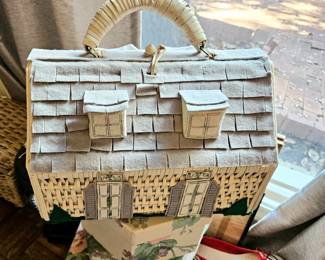 Amusing purse tote in the shape of a house. A red barn design is not shown.