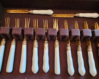 Porcelain handles, brass.