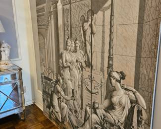 Folding screen mounted to the wall.