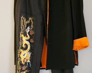 Dramatic tunic jacket and slacks with ornate embroidered dragon down one leg. Size M