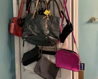 Great selection of purses and carrying bags! Some are brand new with tags!