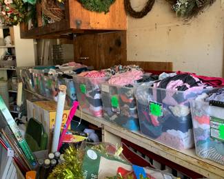 Clothing can be found in tubs marked with sizes. Lots of clothing...most of which has never been worn! Great prices!