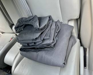 Seat covers for the back passenger seats, and the trunk area. Made by Toyota.