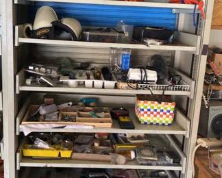 Sliding metal shelf unit