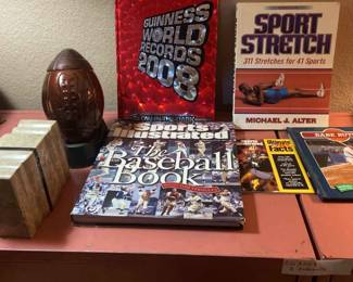 Sports Books, Baseballs, And Basketballs