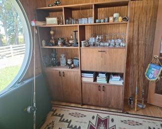 we have 6-7 fishing poles and a vintage tackle box!