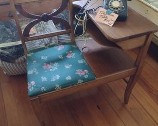 Antique telephone bench with phone