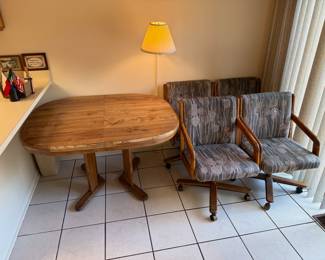Vintage kitchen table and swivel chairs