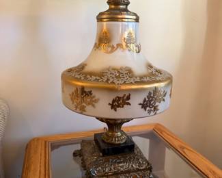 Antique table lamp; white with gold leaf accents; metal base