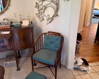 Antique chair with foot rest, by Drexel
