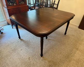 Dining Table with pads and extra leaves
