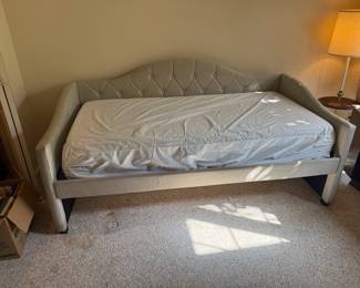 Beige tufted day bed