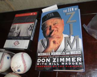 Signed baseballs and book
