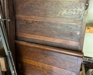 Antique oak bed.