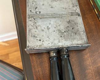 A very cool antique waffle maker.