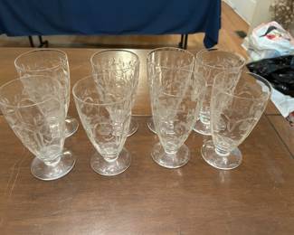 Lots of etched depression era glass.