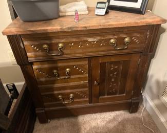 Victorian cabinet with marble top.