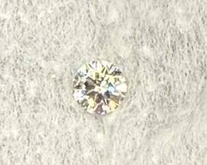 One Loose Round Brilliant Cut Diamond .54 Carat with Grade Report by Gem Trade Laboratory, Inc.
