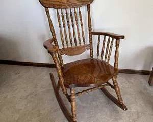 Classic Wooden Rocking Chair with Intricate Carving
