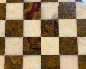 Stunning Marble Chessboard with Rich Colors and Intricate Patterns