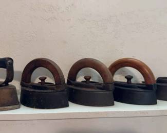 04 Cast Iron and Wood Hand Irons