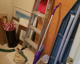 Stepladder; ironing board; household supplies