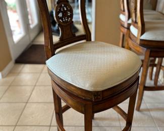 Set of 3 swivel bar stools.