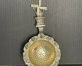 Vintage windmill tea strainer