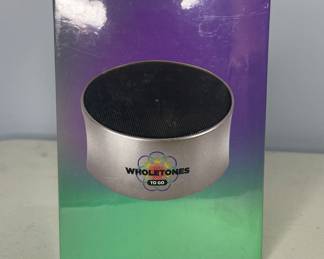 Wholetones portable music player and speaker