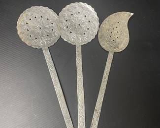 Hammered serving utensils