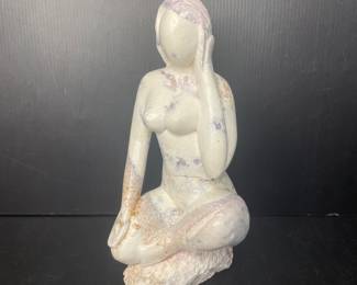 Stone sculpture of woman