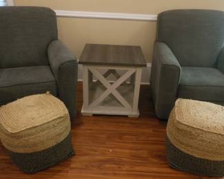 pair of comfy chairs and ottomans