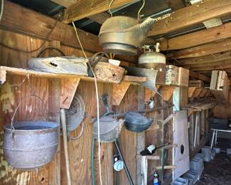 Various cast iron pots and kettles 