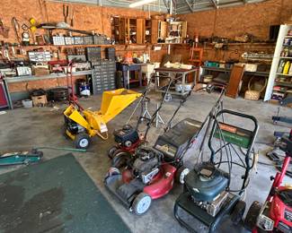 Various lawn equipment . Located in workshop behind garage 