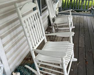 Rocking chairs located front porch 