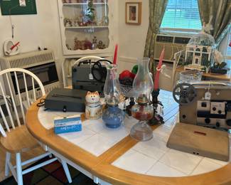 8mm projectors and kerosene lamps .