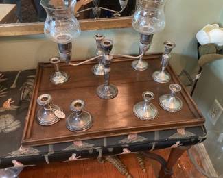 lots of weighted sterling candleholders