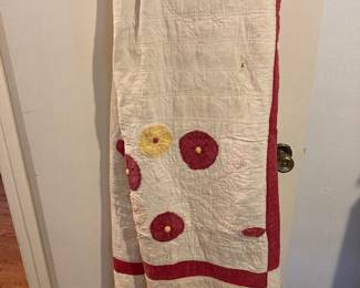 Several vintage and antique quilts