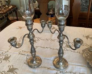 nice pair of sterling candleabras