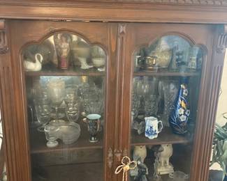 antique china cabinet with some beautiful collectibles
