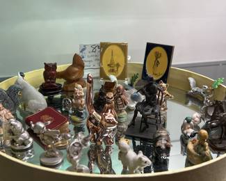 “It’s the little things that mean a lot” collection of miniature figurines and more on a round mirrored tray