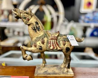 Carved wood horse statue