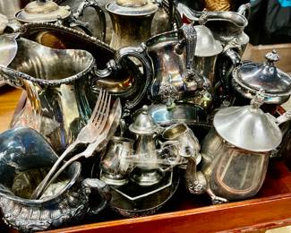 Collection of silver plate pictures pitchers, tea pots, and more