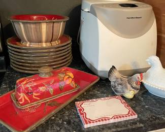 Bread machine and pretty set of red dishes