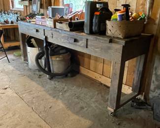 Sturdy work table with drawers and wheels
